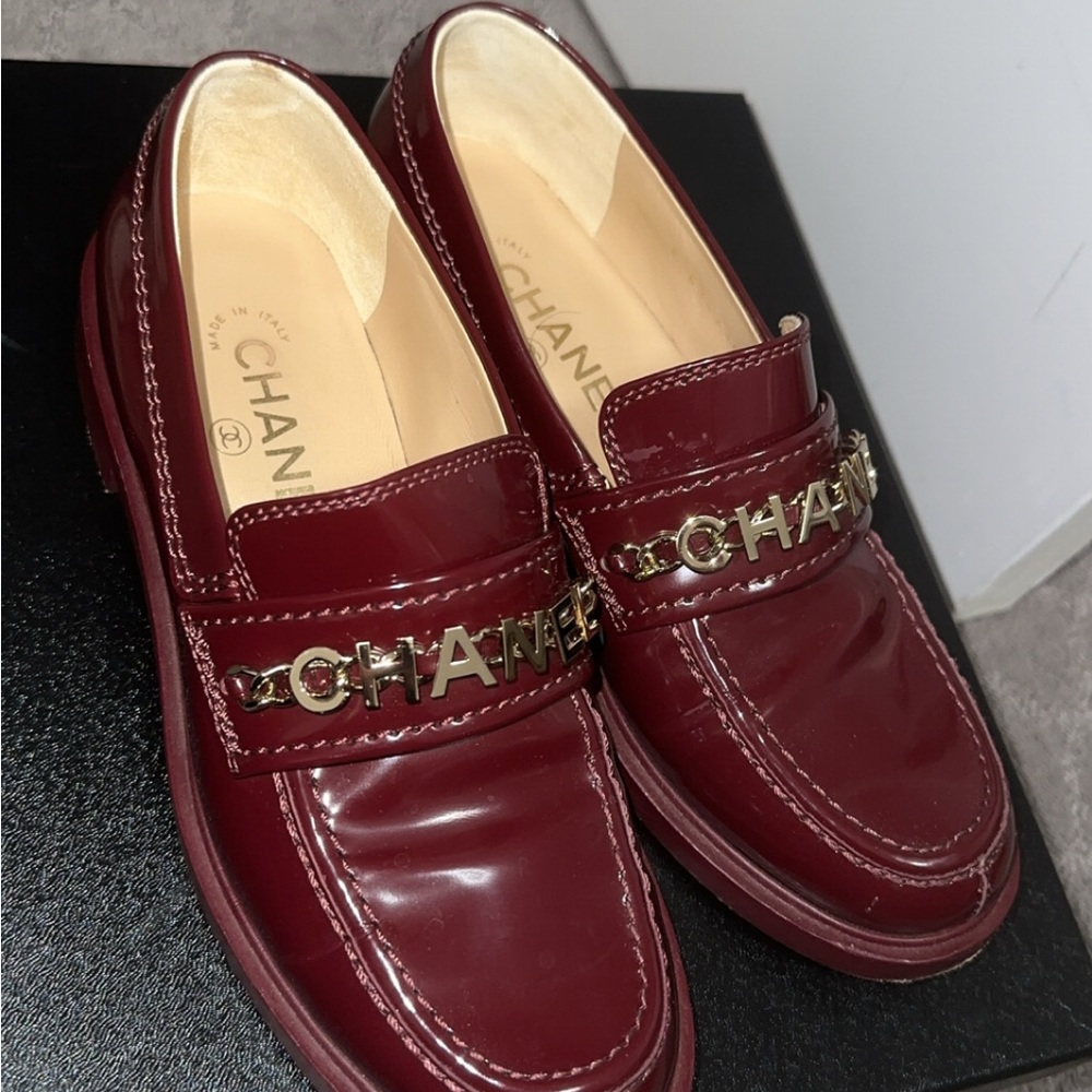 CHANEL women’s burgundy Loafers with Gold Accents